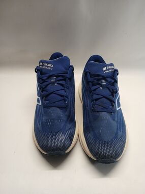 New Balance Blue Running Unisex Sneaker with Pink Accent